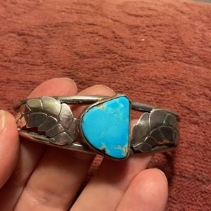 Native American sterling silver and turquoise cuff bracelet. Vintage 1974